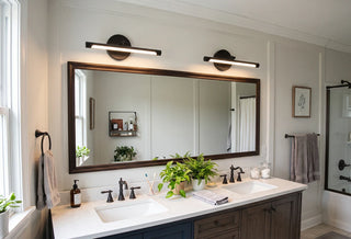 How to Light a Mirror or a Painting: A Guide to Picture Lights and Vanity Wall Lights
