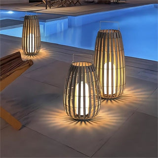 Rattan Weaving Oval Cage Outdoor Patio Waterproof Floor Lamp. Garden Rattan Floor Lamp. Rattan Floor Lamp. Rattan Portable Lantern. Waterproof Solar Outdoor Lights.