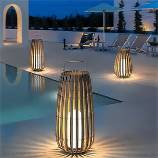 Rattan Weaving Oval Cage Outdoor Patio Waterproof Floor Lamp. Garden Rattan Floor Lamp. Rattan Floor Lamp. Rattan Portable Lantern. Waterproof Solar Outdoor Lights.