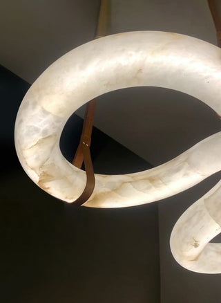 Infinity Hanging Light. oslo pendant. leather lighting. Infinity Pendant Light. Infinity LED Pendant. Infinity Alabaster Chandelier by Atelier Alain Ellou. Infinity Alabaster Chandelier.