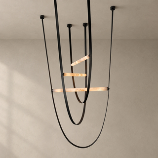 Altalena Leather Alabaster Pendant Light Vidirlighting 1-Light Linear Horizontal Alabaster Beam with Black Leather Straps and Brushed Brass Canopies Studio Shot