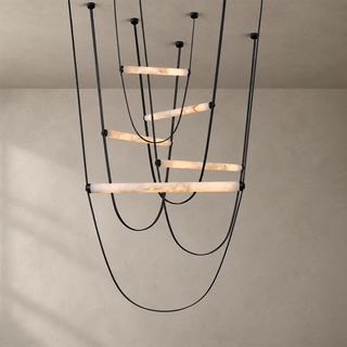 Altalena Leather Alabaster Pendant Light Vidirlighting 3-Tier Cascading Swing Chandelier with Cognac Brown Leather Straps and Matte Black Canopies Studio Shot