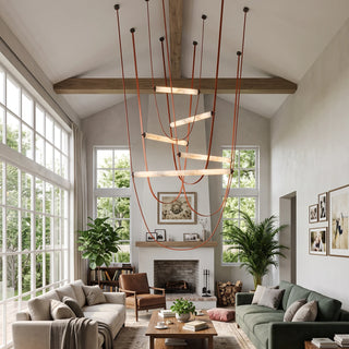 Altalena Leather Alabaster Pendant Light Vidirlighting Black Leather Straps and Brushed Brass Canopies Holding Alabaster Tube over Grey Kitchen Island