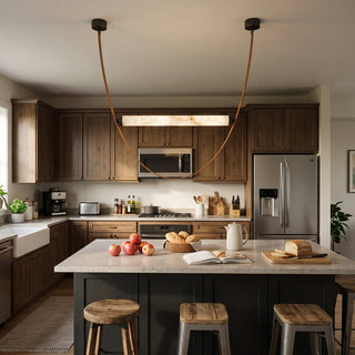 Altalena Leather Alabaster Pendant Light Vidirlighting Single Glowing Alabaster Cylinder in Cognac Leather U-Loop Swing Pendant over Wood Kitchen Island