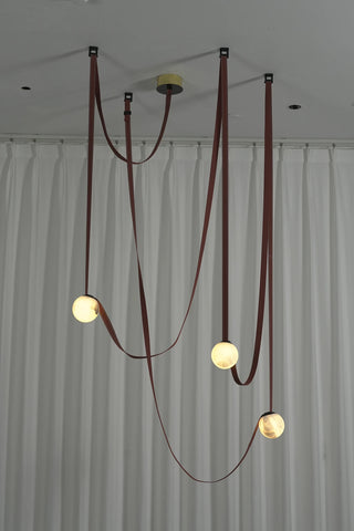 Anouk Draped Strap Alabaster Chandelier Vidirlighting Fully Lit 3-Light Fixture Casting Warm Amber Glow through Translucent Alabaster Spheres with Draped Straps