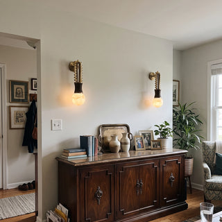 Ardora Beaded Alabaster Wall Sconce Vidirlighting Antique Brass Pair Symmetrically Flanking Dark Wood Carved Dining Room Buffet Sideboard