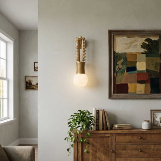 Ardora Beaded Alabaster Wall Sconce Vidirlighting Illuminating Abstract Framed Art Print above Mid-Century Wood Cabinet in Entry Hallway