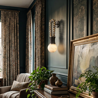 Ardora Beaded Alabaster Wall Sconce Vidirlighting Set against Moody Forest Green Walls beside Ornate Gilt Oil Painting and Vintage Armchair