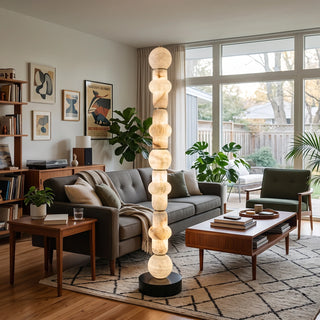 Cairn Alabaster Stacked Floor Lamp Vidirlighting Welcoming Soft Glow beside Foyer Console Table and Potted Ficus Tree in Bright Entryway