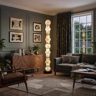 Cairn Alabaster Stacked Floor Lamp Vidirlighting Warm Ambient Light in Mid-Century Living Room with Vintage Armchairs and Geometric Carpet