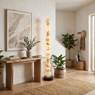 Cairn Alabaster Stacked Floor Lamp Vidirlighting Illuminating Evening Living Room with Panoramic Garden Windows and Leather Lounge Chair