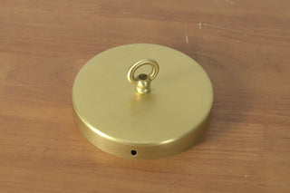 Carillon Chain Alabaster Bell Chandelier Vidirlighting Brushed Brass Round Ceiling Canopy Plate with Threaded Loop Eyelet Hook Hardware Accessory on Wooden Surface