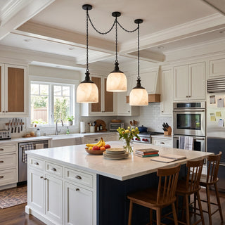Carillon Chain Alabaster Bell Chandelier Vidirlighting Matte Black 3-Light Linear Swag Chain Pendant below Coffered Ceiling over White Kitchen Island