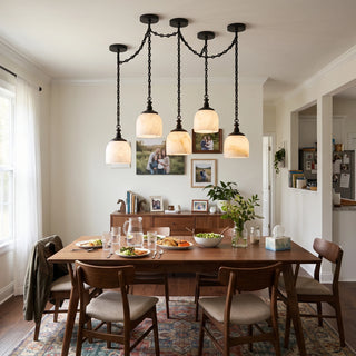 Carillon Chain Alabaster Bell Chandelier Vidirlighting Matte Black 3-Light Swag Chain Cluster Chandelier over Round Wooden Dining Table