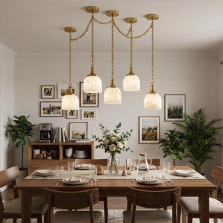 Carillon Chain Alabaster Bell Chandelier Vidirlighting Warm Brass 4-Light Linear Swag Chain Chandelier over Dining Table with Gallery Wall
