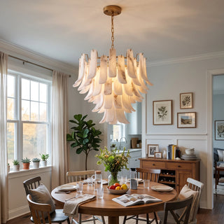 Cascata Alabaster Petal Chandelier Vidirlighting Cascading Petal Stone Chandelier Centered over Long Natural Wood Table by Sliding Patio Doors
