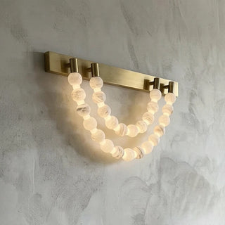 Collana Alabaster Bead Wall Sconce Vidirlighting Studio Test of Single Vertical Linear Alabaster Beaded Strand Wall Sconce on Dark Grey Wall