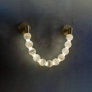 Collana Alabaster Bead Wall Sconce Vidirlighting Macro Detail of Hand-Carved Translucent Alabaster Stone Spheres Glowing with Radiant Warmth