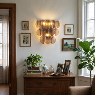 Conca Glass Disc Wall Sconce Vidirlighting Single Amber Glass Disc Sconce Casting Golden Radial Glow above Dark Wood Entryway Console