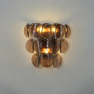 Conca Glass Disc Wall Sconce Vidirlighting Illuminated in Dark Environment Demonstrating Dramatic Warm Light Peeking through Smoke Glass Discs