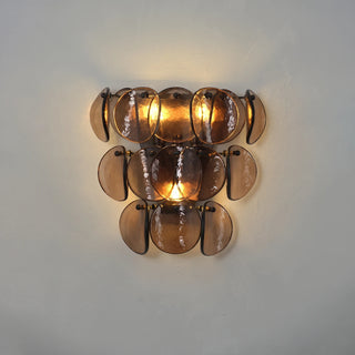 Conca Glass Disc Wall Sconce Vidirlighting Factory Lit Frontal Test Emitting Radiant Amber Glow Diffusing through Textured Glass Scales