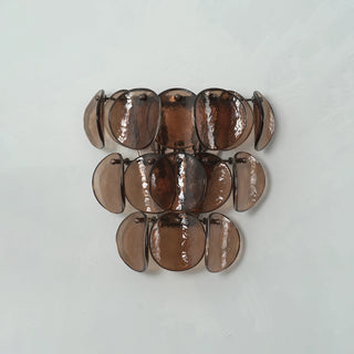 Conca Glass Disc Wall Sconce Vidirlighting Daylight Unlit Frontal View Showcasing Authentic Texture of Hand-Poured Glass Discs on Wall