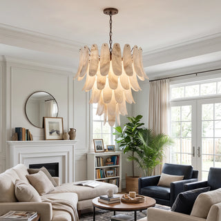 Cygnus Alabaster Feather Chandelier Vidirlighting Cascading Natural Stone Feather Leaves Pendant over Formal Dining Room Table with Sheer Window Curtains
