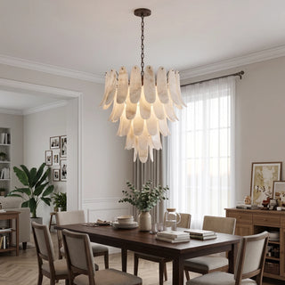 Cygnus Alabaster Feather Chandelier Vidirlighting Warm Glowing Stone Feather Chandelier Centered over Dining Table near Arched Hallway Entrance