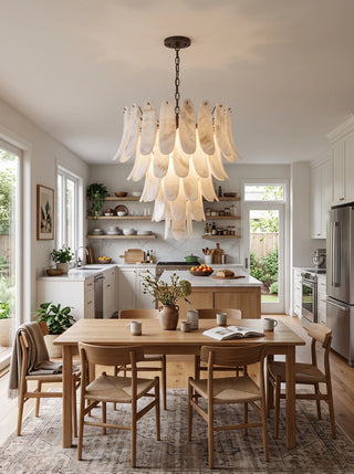 Cygnus Alabaster Feather Chandelier Vidirlighting Elegant Organic Alabaster Petal Chandelier Hanging above Dining Table with Garden Patio Doors