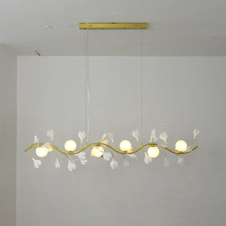 Front view of illuminated Ginkgo Vine linear branch chandelier with warm glowing globes by Vidir Lighting