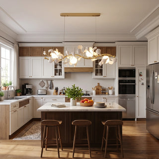 Ginkgo Vine linear chandelier centered over a modern two-tone kitchen island by Vidir Lighting