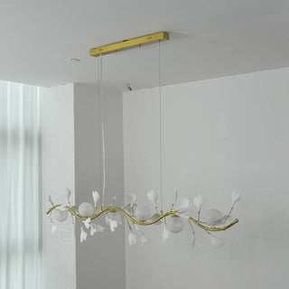 Side perspective studio view of unlit Ginkgo Vine linear branch chandelier by Vidir Lighting