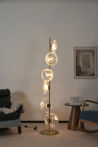 Glass Petals Floor Lamp Vidirlighting Centered View Illuminated in Modern Lounge Reading Corner Providing Soft Diffuse Ambient Light