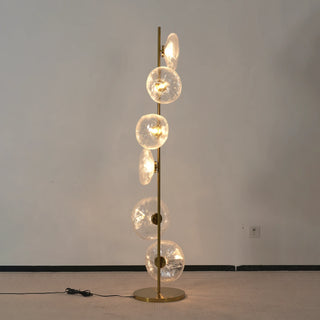 Glass Petals Floor Lamp Vidirlighting Moody Evening Setting Highlighting Sculptural Floral Silhouette and Golden Light Rays on Wall