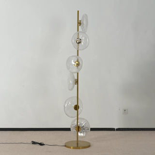Glass Petals Floor Lamp Vidirlighting Lit Ambient Studio Display Highlighting Sparkling Refractive Glass Petals and Polished Brass Base