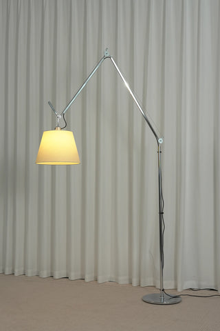 Gru Adjustable Arm Floor Lamp Vidirlighting Illuminated Studio Profile Showing Radiant Warm Ambient Glow Diffusing from Tapered Shade at High Reach