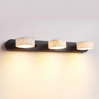 Kumo Alabaster and Walnut Wood Wall Sconce 3-Light Vanity Lamp Illuminated Studio Shot - Vidirlighting