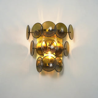 Lente Hammered Glass Disc Wall Sconce Vidirlighting Illuminated Factory Test Casting Warm Golden Ambient Light through Tiered Amber Hammered Glass