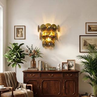 Lente Hammered Glass Disc Wall Sconce Vidirlighting Luxurious Amber Glass Disc Wall Sconces Symmetrically Flanking White Marble Fireplace in Great Room
