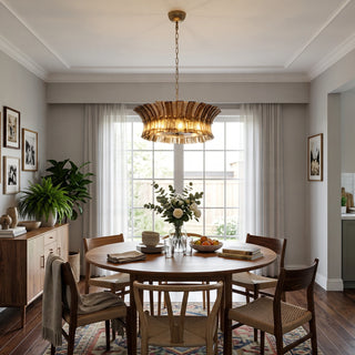 Lido amber smoke textured glass chandelier over a round dining table by Vidir Lighting
