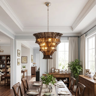 Lido tiered amber smoke textured glass chandelier hanging in an elegant dining room by Vidir Lighting