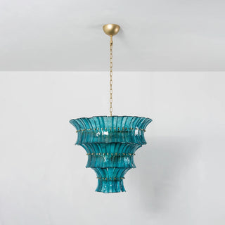 Front view of unlit Lido teal blue tiered textured glass chandelier by Vidir Lighting