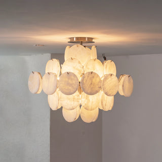 Lunaria Alabaster Disc Ceiling Light Vidirlighting Nighttime Lit Display Casting Gorgeous Radial Warm Shadows and Highlighting Natural Alabaster Veining