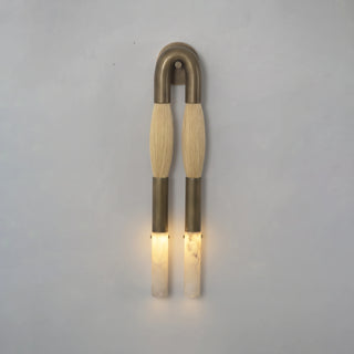 Pennello Horsehair Alabaster Wall Sconce Vidirlighting Angled Studio Perspective Highlighting Dimensional Depth and Texture on Wall