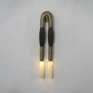 Pennello Horsehair Alabaster Wall Sconce Vidirlighting Frontal Studio Illumination Test of Brass and Dark Horsehair Sconce on Grey Wall
