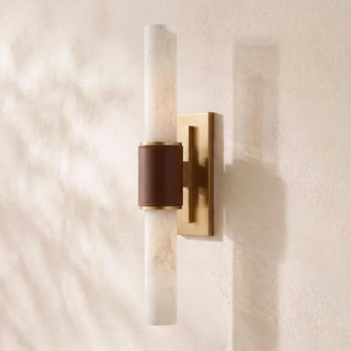 Stela Alabaster Cylinder Wall Sconce Vidirlighting Single Tall Vertical Alabaster Tube with Stitched Leather Band and Matte Black Backplate for Architectural Entry Foyer