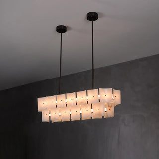 Tegola Two-Tier Alabaster Chandelier Vidirlighting Studio Display of Fully Lit Round Two-Tier Alabaster Drum Chandelier on Grey Wall