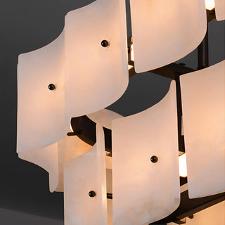 Tegola Two-Tier Alabaster Chandelier Vidirlighting Studio Display of Fully Lit Linear Two-Tier Alabaster Tile Chandelier on Grey Wall