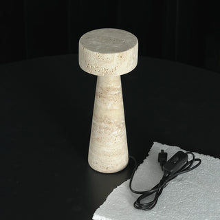 Travertine Kiwa Conical Table Lamp Vidirlighting Lying Horizontally Showing Hollow Stone Lampshade Cavity and Electrical Cable Entry Construction