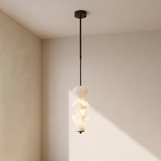 Trottola Alabaster Stacked Pendant Light Vidirlighting 4-Tier Matte Black Stem Stacked Alabaster Pendant Light Fully Illuminated on Neutral Wall